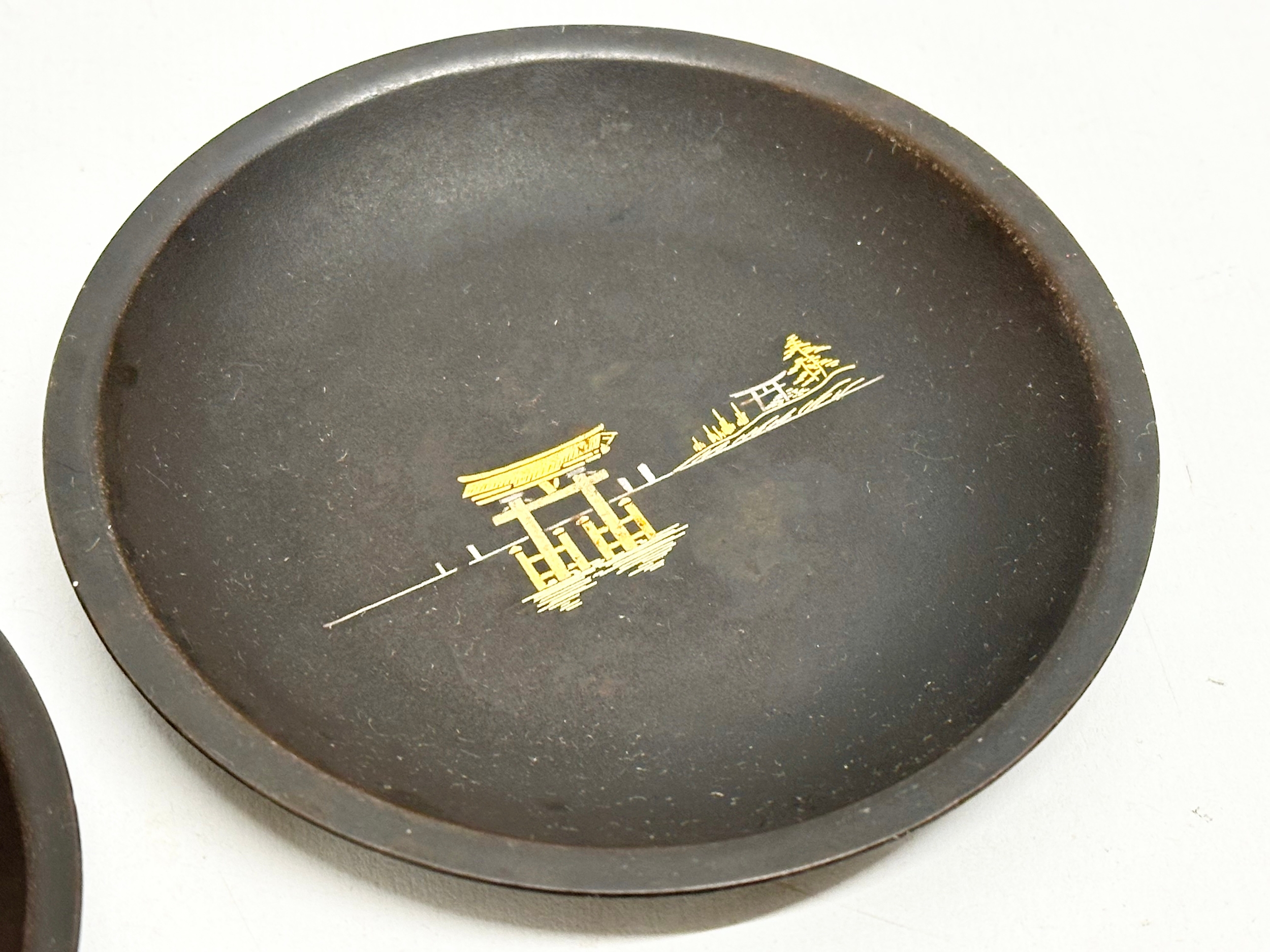 An excellent set of 6 signed Japanese Meiji period Amita gold and silver inlaid iron dishes. 10cm - Image 6 of 10