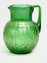A Loetz ‘Neptune’ water jug. Circa 1900. 13x12x16cm