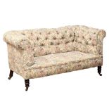 A Late 19th Century Victorian deep button back 2 seater sofa on turned legs. Circa 1880. 164.5cm