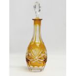 A 20th Century Nachtmann stained amber glass decanter. 31cm