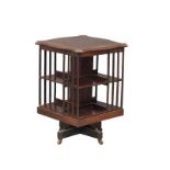 An Edwardian inlaid mahogany revolving bookcase. 49x70cm