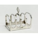 A silver toast rack. Sheffield 1932. 56.07 grams.