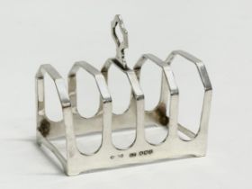 A silver toast rack. Sheffield 1932. 56.07 grams.
