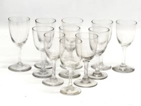 A set of 11 Mid 19th Century Victorian port glasses. Circa 1850-1870. 11.5cm. 12cm