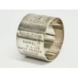 A silver napkin ring. Christmas 1928. A Gold Souvenir of Bukit Timah, Garrison, Keppel, K.L, Bukit
