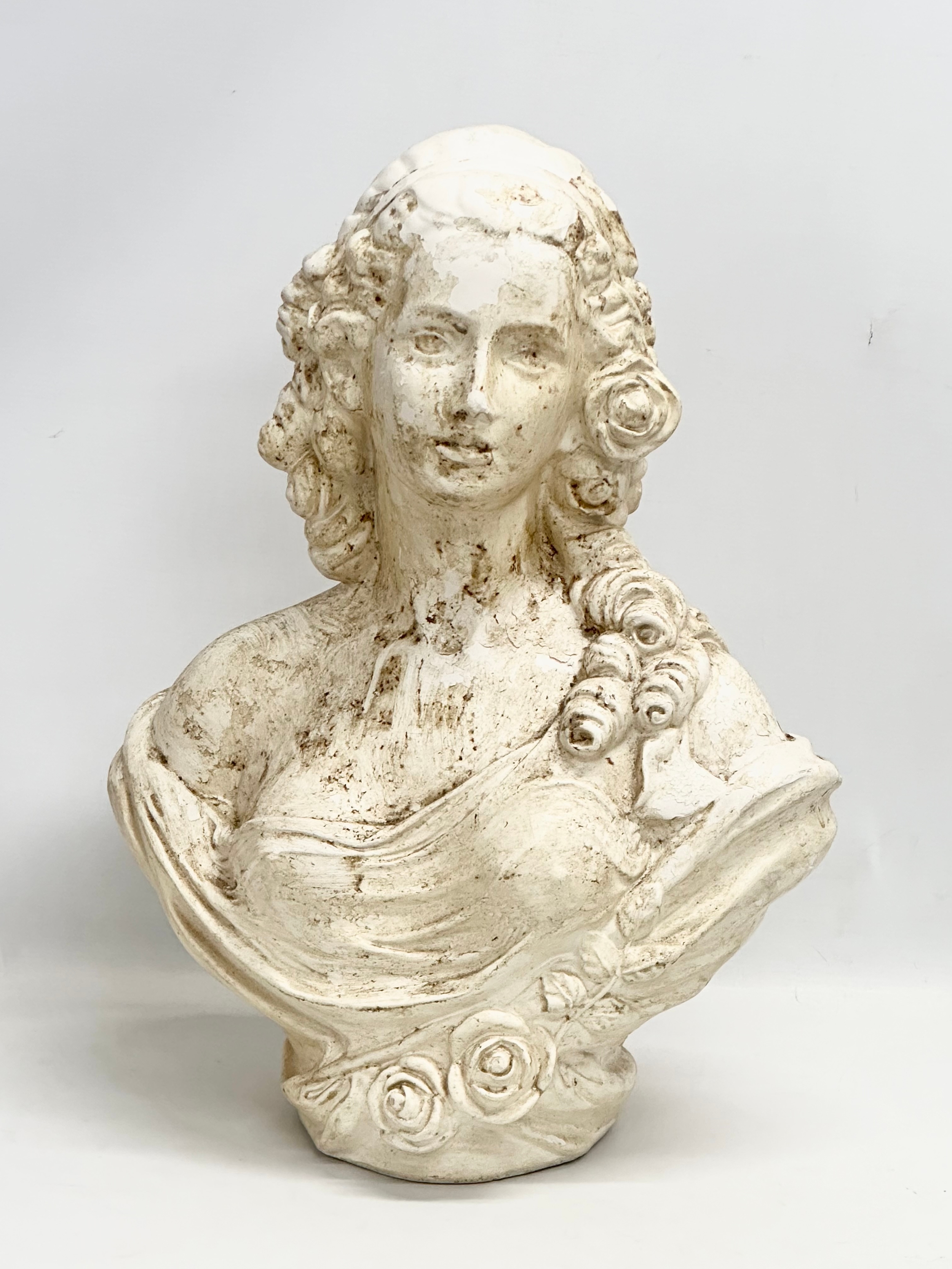 A large 20th Century plaster bust of Grecian lady. 40x54cm