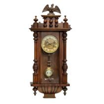 A Late 19th Century Victorian spring Vienna wall clock. With key and pendulum. 34x82cm