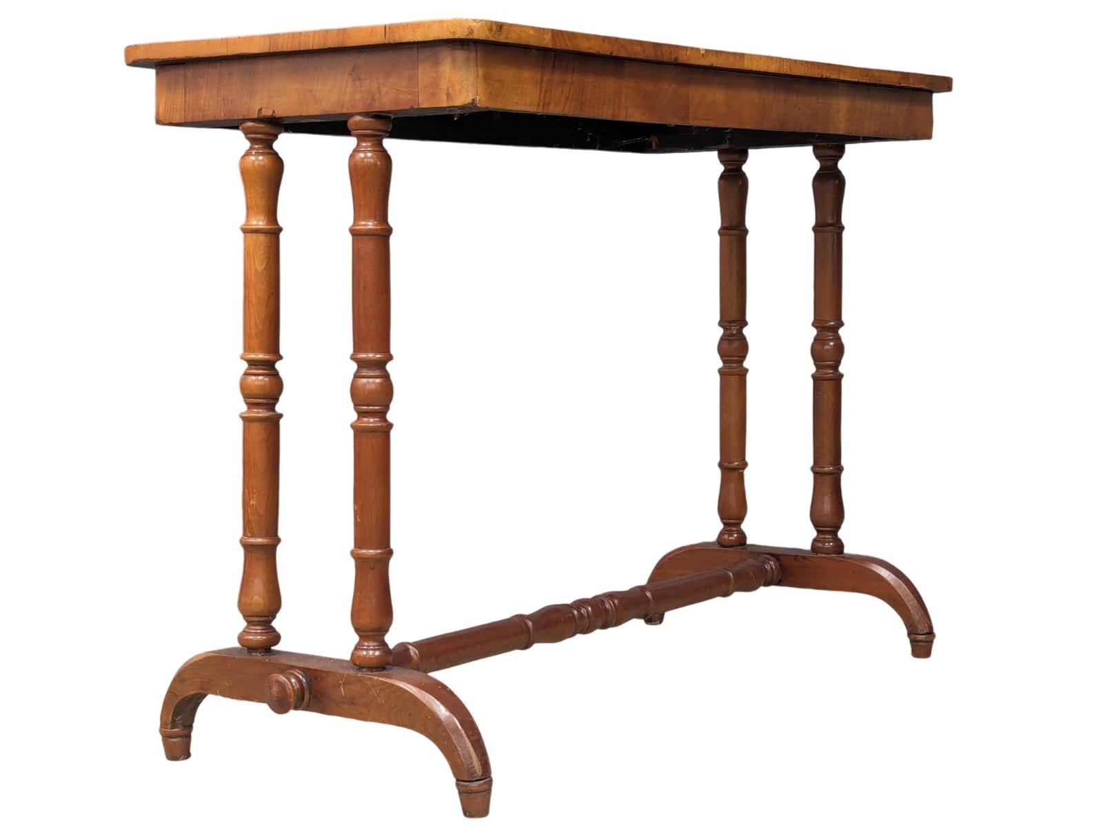 A 19th Century I laid walnut games table with stretcher support, 1870s. 89cm x 44cm x 69cm - Image 5 of 5