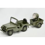 A vintage Marx army jeep and trailer. 88cm
