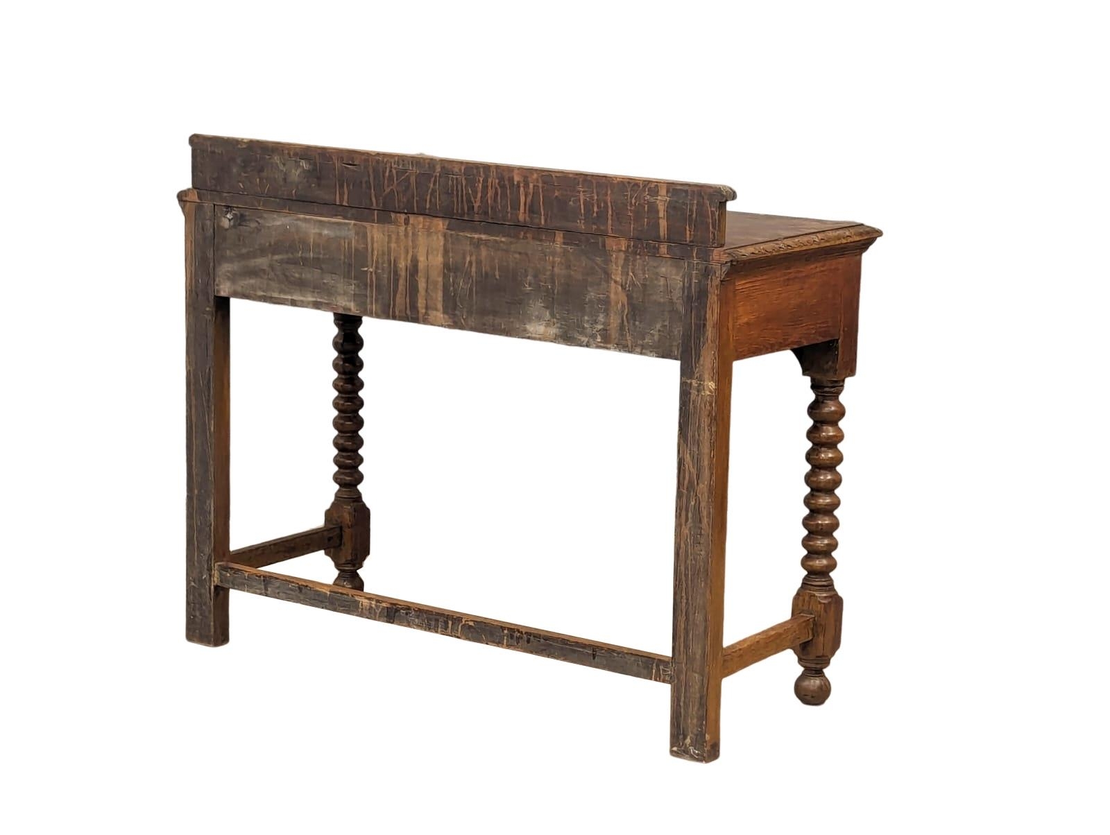 A late Victorian carved oak hall table with bobbin turn legs and Man Of The Forest handles, 107cm - Bild 4 aus 6