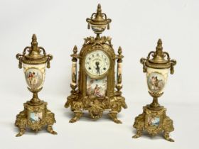An 18th century style Franz Hermle brass clock set. Clock measures 22x41cm.