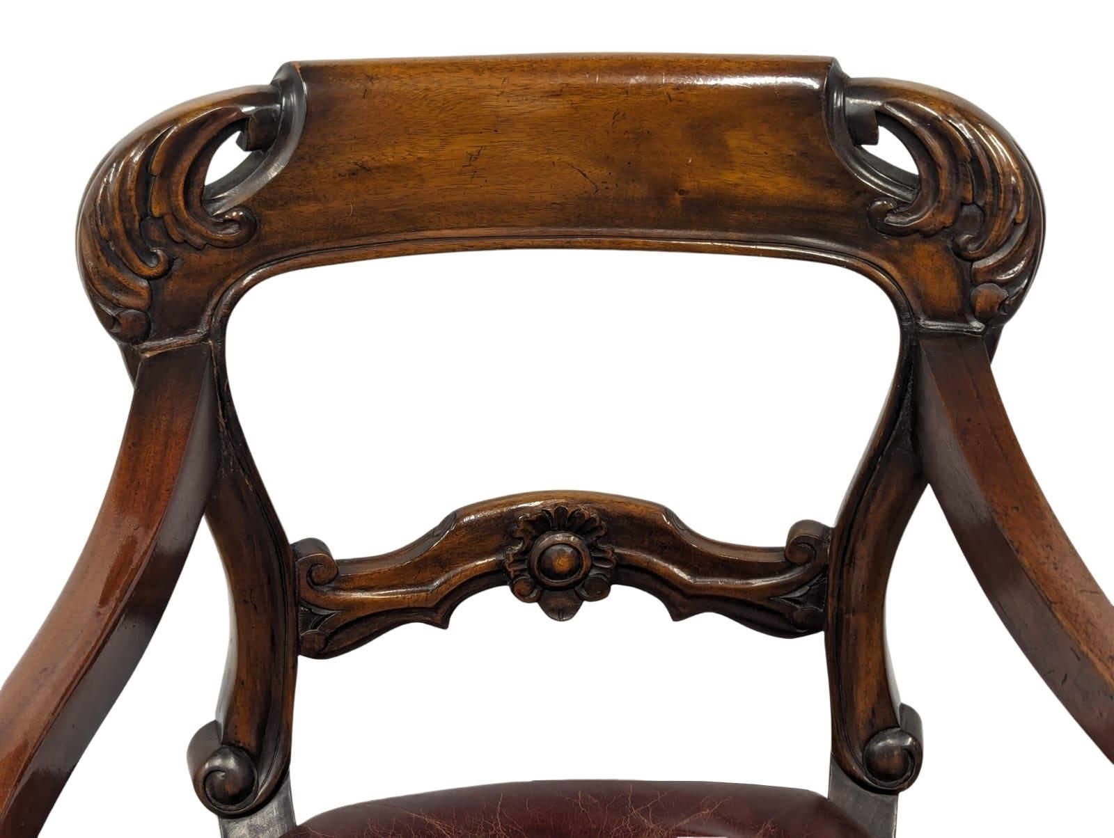 A William IV style mahogany armchair with scroll arms and leather seat - Image 6 of 8