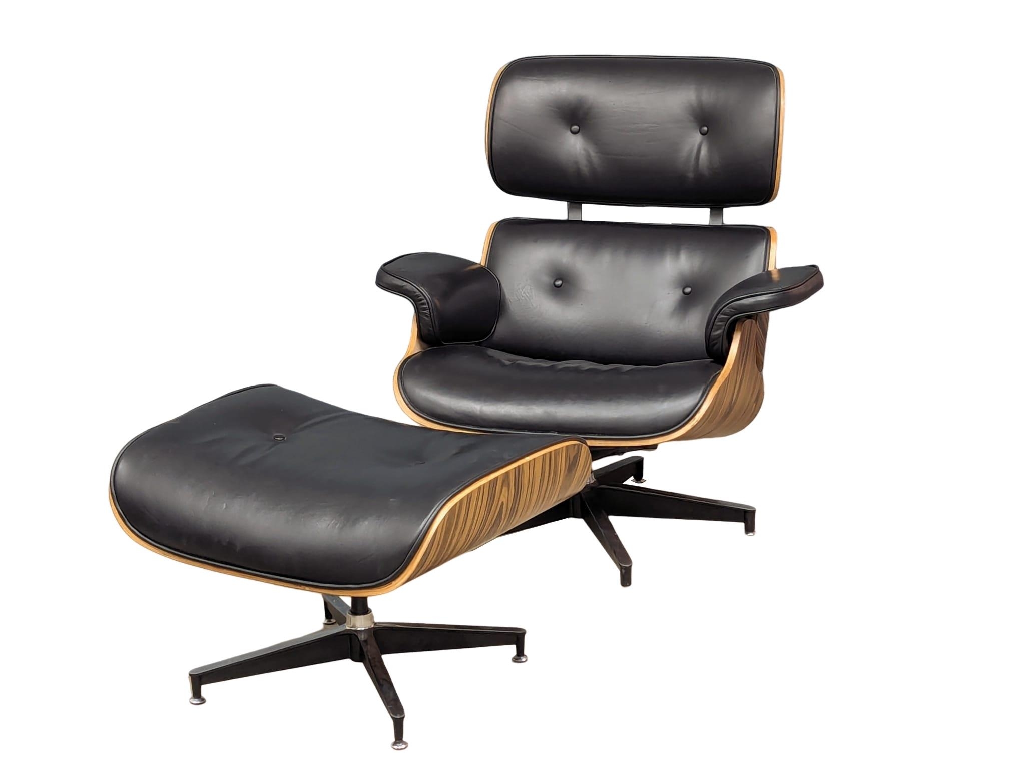 A Charles & Ray Eames Style swivel chair and ottoman.