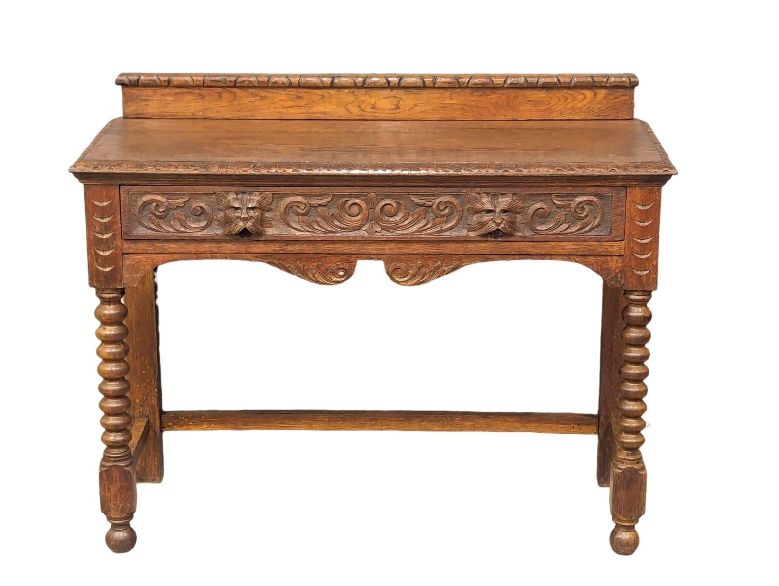 A late Victorian carved oak hall table with bobbin turn legs and Man Of The Forest handles, 107cm - Bild 2 aus 6