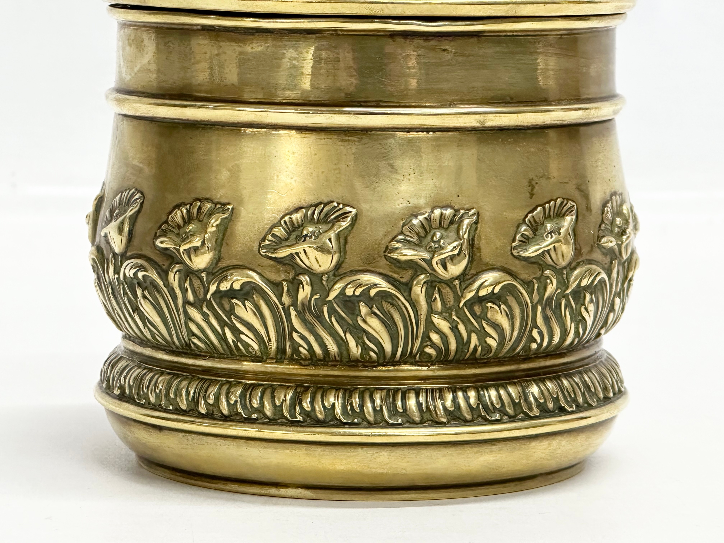A Late 19th Century brass tobacco jar with lid. 11x13cm - Image 3 of 5