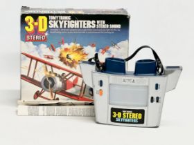 A 1983 Tomytronic 3D Stereo Skyfighters game with original box.
