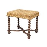 A late 19th Century oak stool with barley twist supports and stretcher in the Carolinian style. With