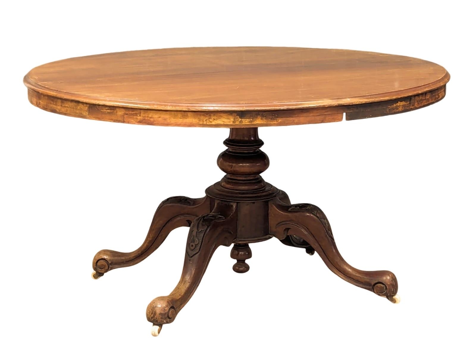 A mid 19th Century mahogany breakfast table on cabriole legs, 133cm x 103cm x 69cm