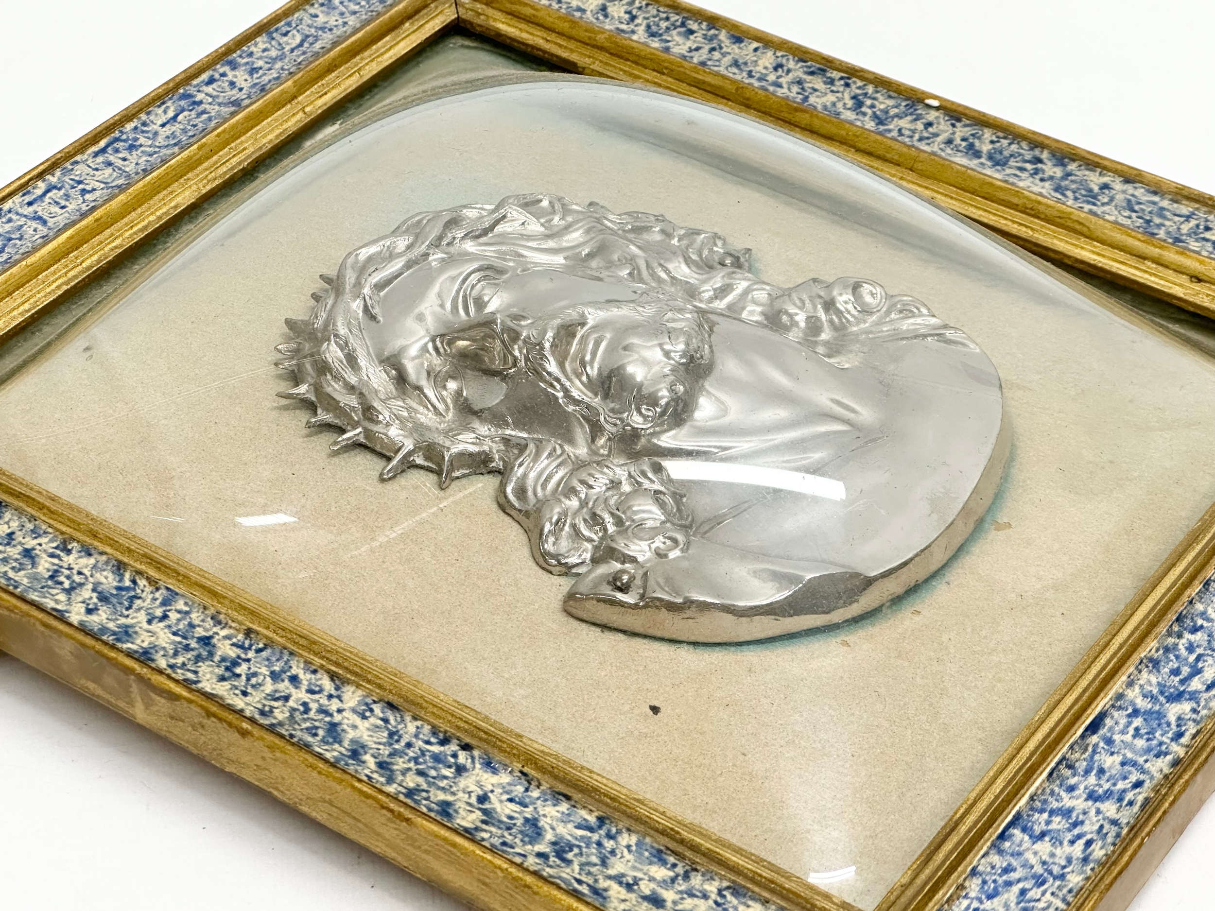 A pair of Early 20th Century plated religious wall plaques with convex glass and gilt frames. - Image 2 of 8