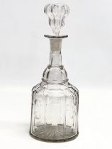 A Late 18th/Early 19th Century George III decanter. Circa 1790-1810. 31.5cm