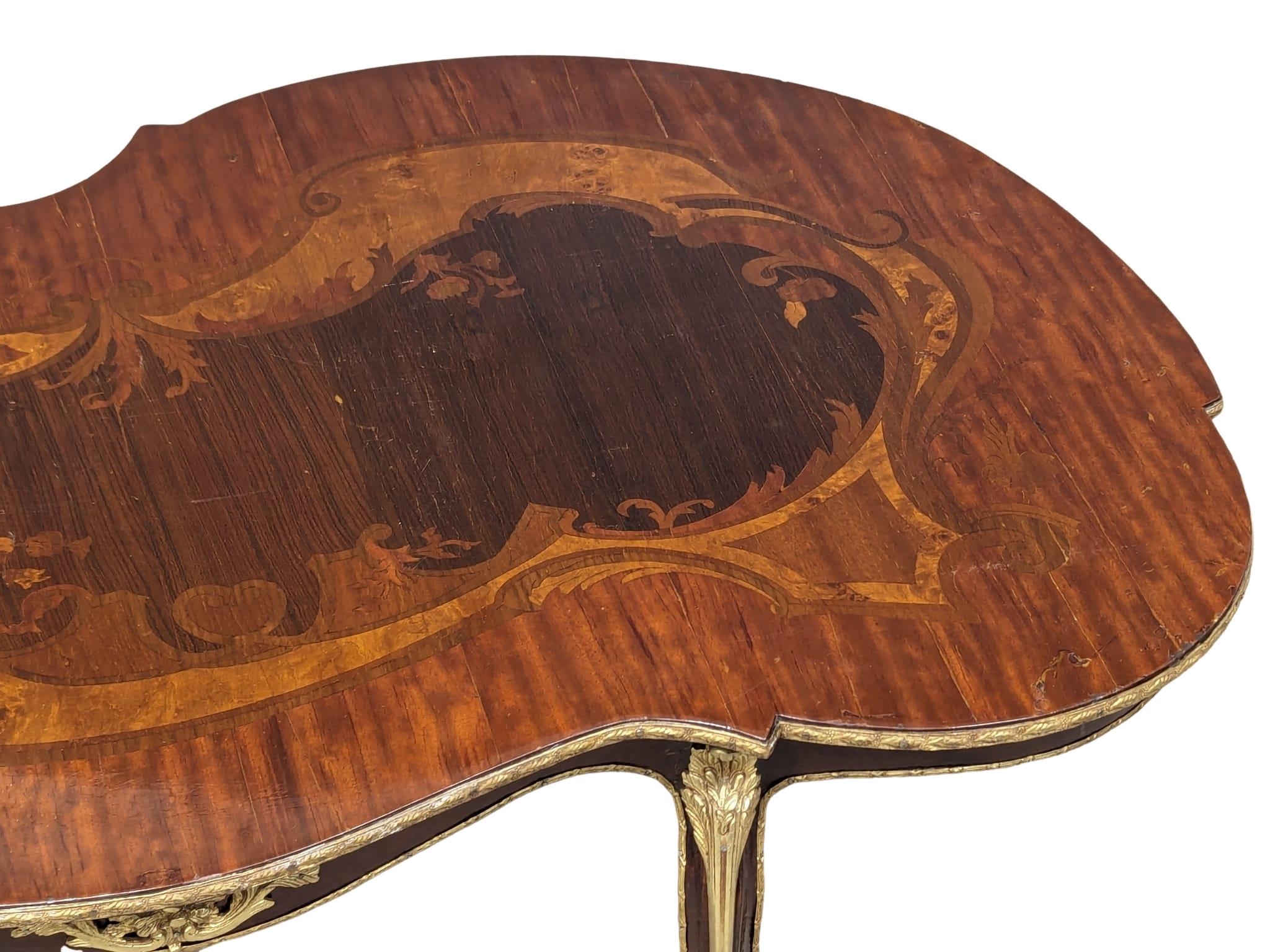 An Italian inlaid coffee table with brass mounts. 115x67x46cm - Image 5 of 6