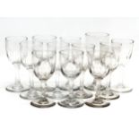 A set of 12 Mid 19th Century Victorian slice cut port glasses. 12cm. 11.5cm. 11cm.