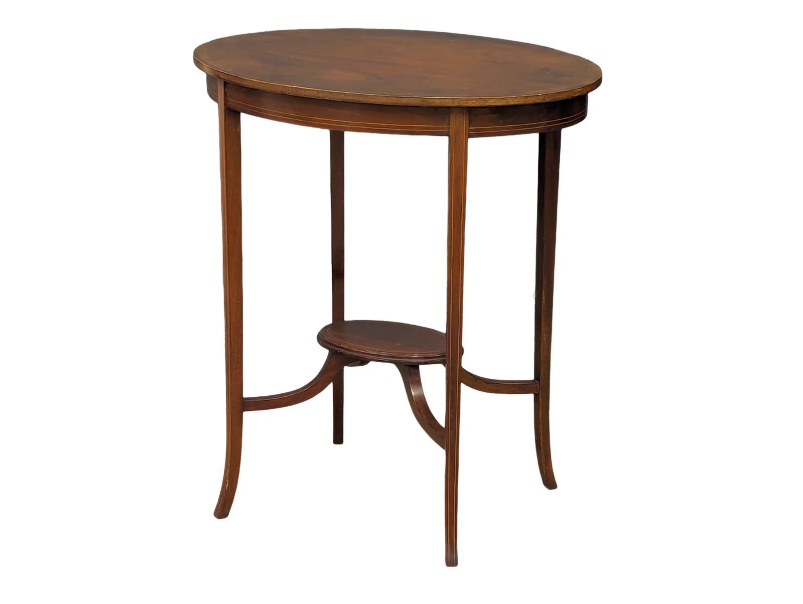 An Edwardian inlaid mahogany side table. 65x47x72cm