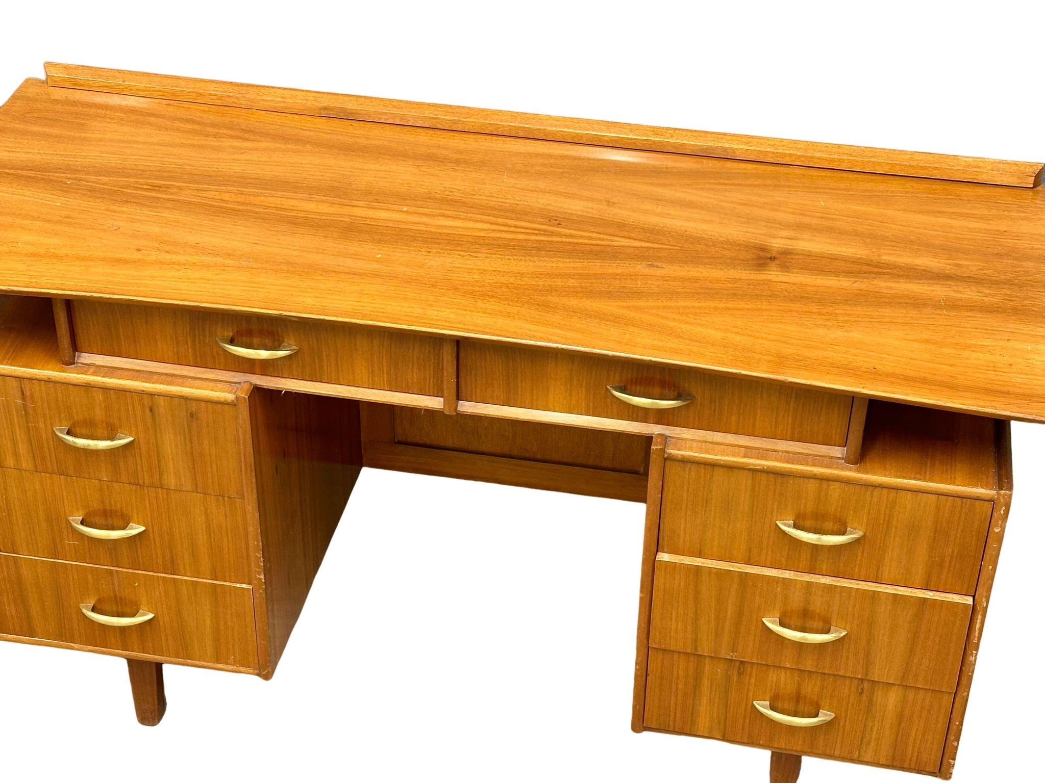 A Mid Century walnut desk/dressing table, 131cm x 49cm x 74.5cm - Image 5 of 5