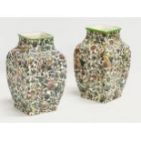 A pair of Early 20th Century Royal Doulton ‘Persian’ vases. 12x12x20cm