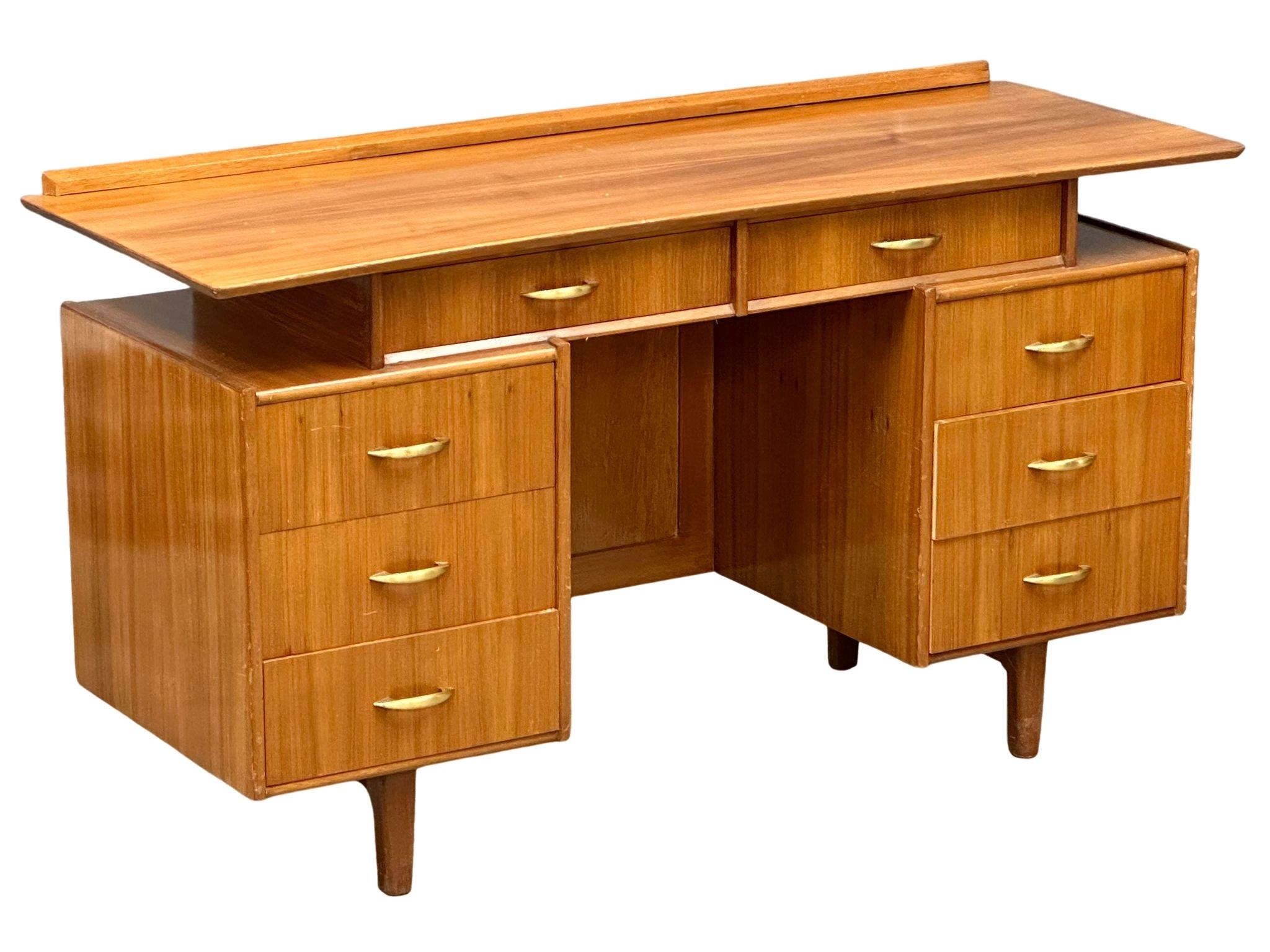 A Mid Century walnut desk/dressing table, 131cm x 49cm x 74.5cm - Image 2 of 5