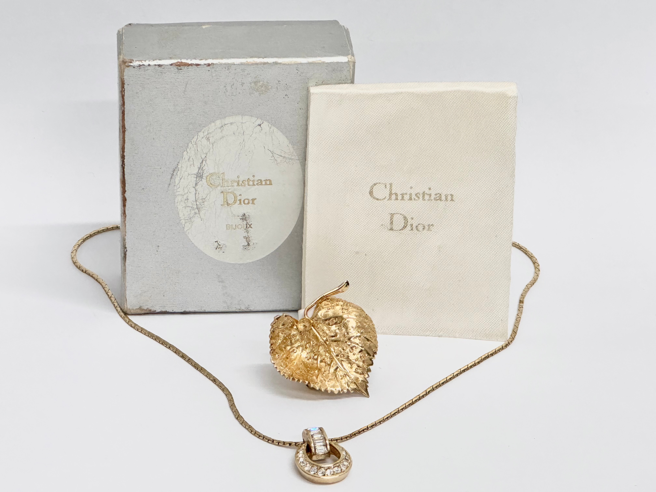 Christian Dior necklace and brooch with box.
