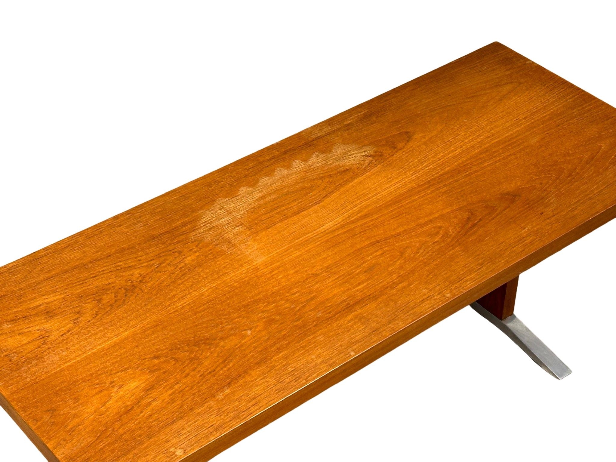 A Danish Mid Century teak coffee table on chromed feet. 120x48x44cm - Image 2 of 4