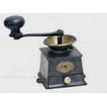 A Late 19th Century Archibald Kenrick & Sons cast iron coffee grinder.