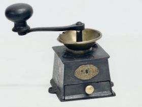 A Late 19th Century Archibald Kenrick & Sons cast iron coffee grinder.