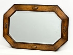 An Early 20th Century oak framed bevelled mirror. Circa 1900-1910. 69x47cm