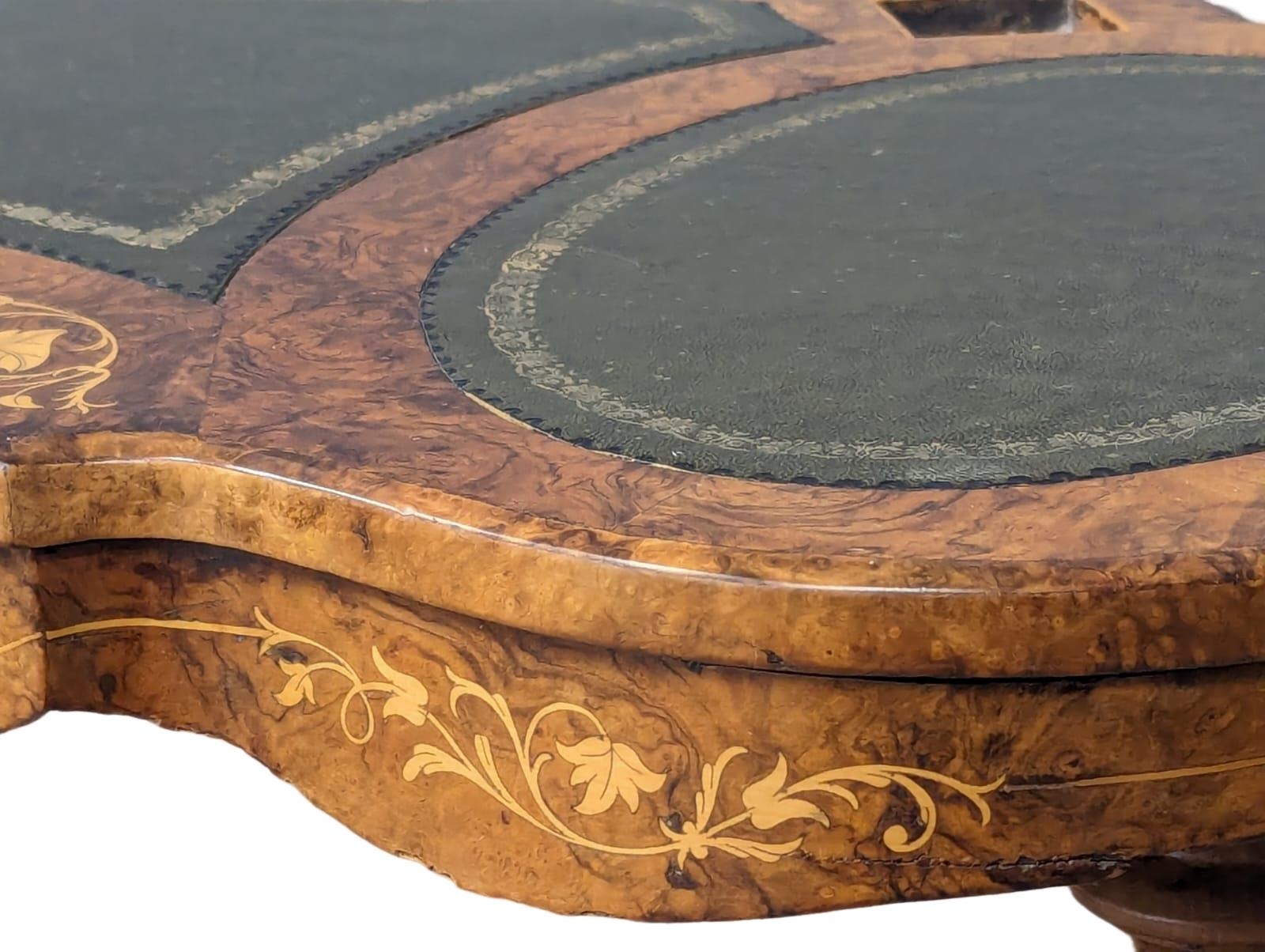 A Mid Victorian Burr Walnut writing table with a tooled leather top. Circa 1860s. 105x48x71cm - Image 3 of 7