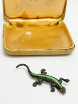 An Early 20th Century silver lizard brooch with case.