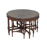 A mahogany coffee table with 4 nesting tables. 76x49cm