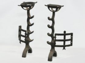 A pair of large 17th Century style cast iron fire andirons. 23x56cm