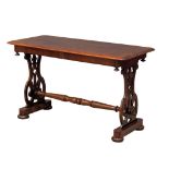 A mid Victorian mahogany side table with stretcher and open fret decoration, circa 1860s. 97cm x