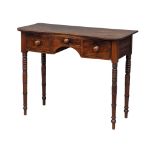 A George IV mahogany side table with 3 drawers and reeded legs. Circa 1820. 102x45x83cm