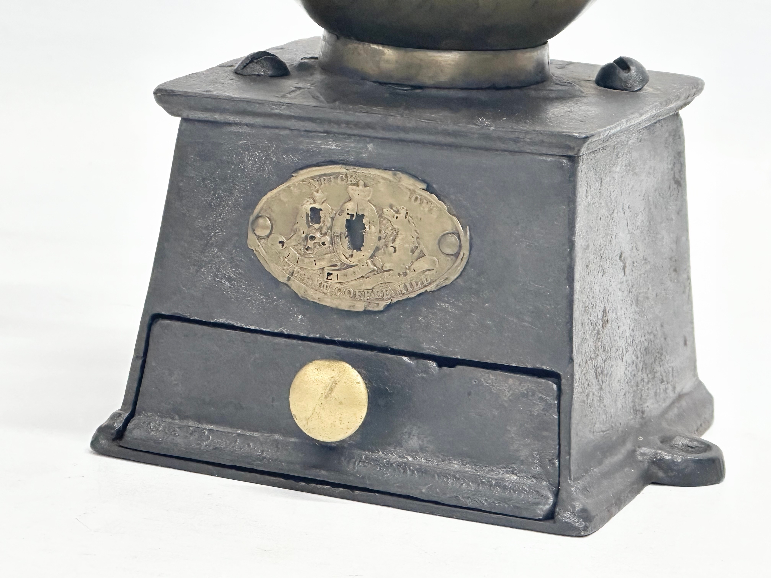 A Late 19th Century Archibald Kenrick & Sons cast iron coffee grinder. - Image 2 of 7