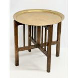 A St Dunstan’s War Blinded Soldier oak framed folding table with brass top. 50x50cm