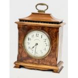 An Early 20th Century Walker & Hall burr walnut mantle clock. French works. 16x8x21cm