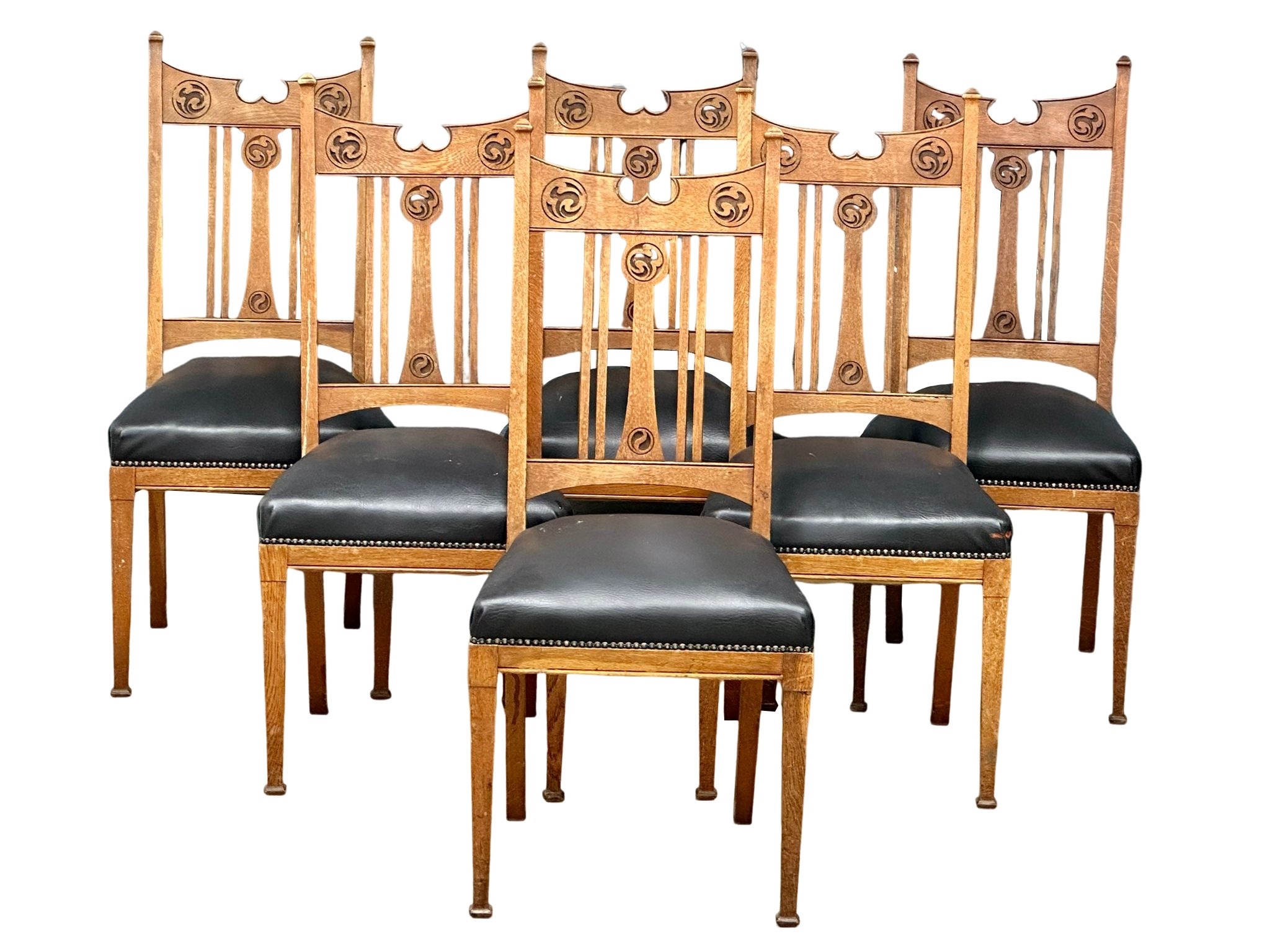 A set of 6 Early 20th Century Arts & Crafts oak dining chairs. Circa 1900.