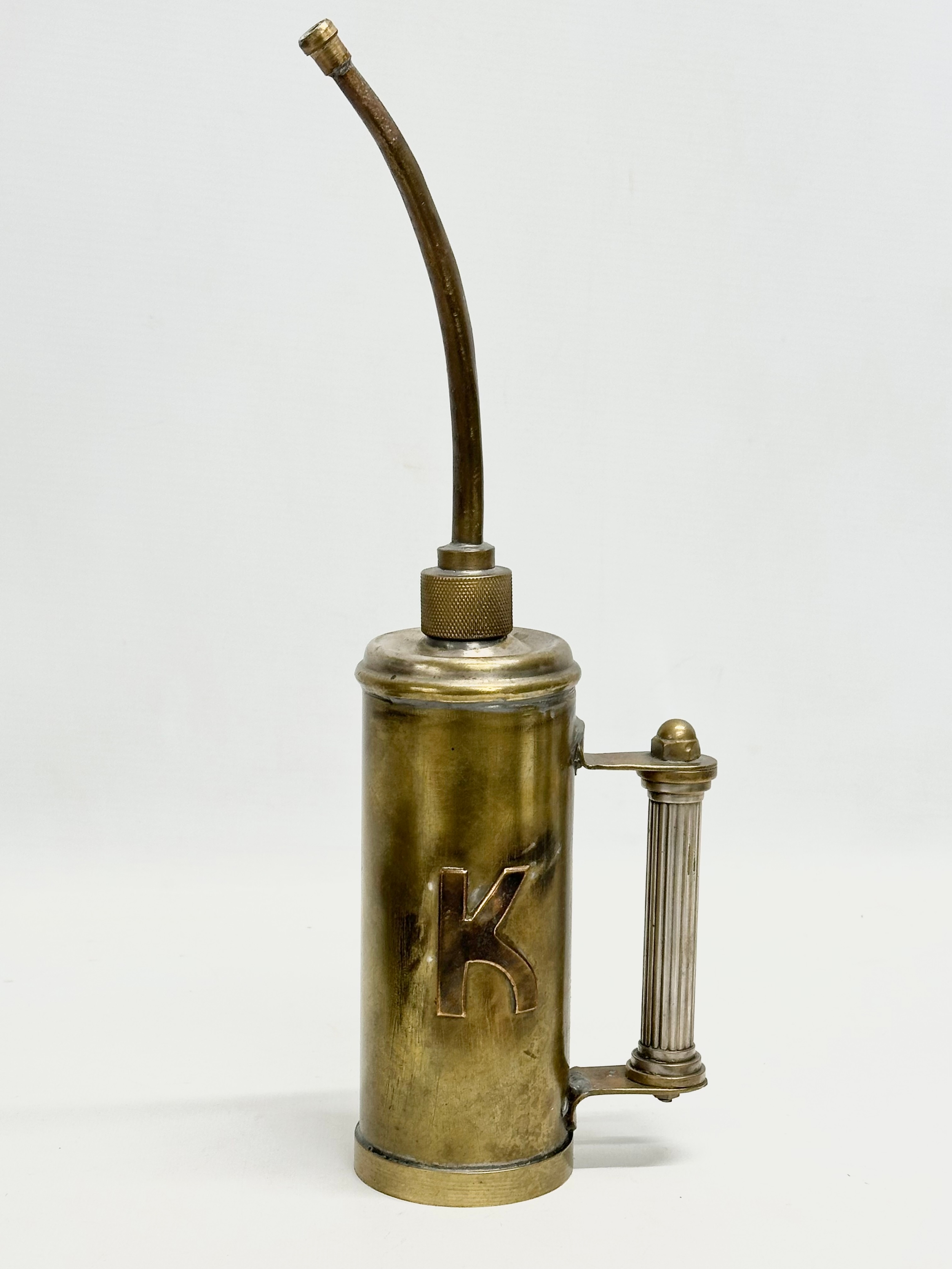 A job lot. An oil dispenser 34cm. A large ornamental key 28cm. An iron on trivet stand. - Image 4 of 5