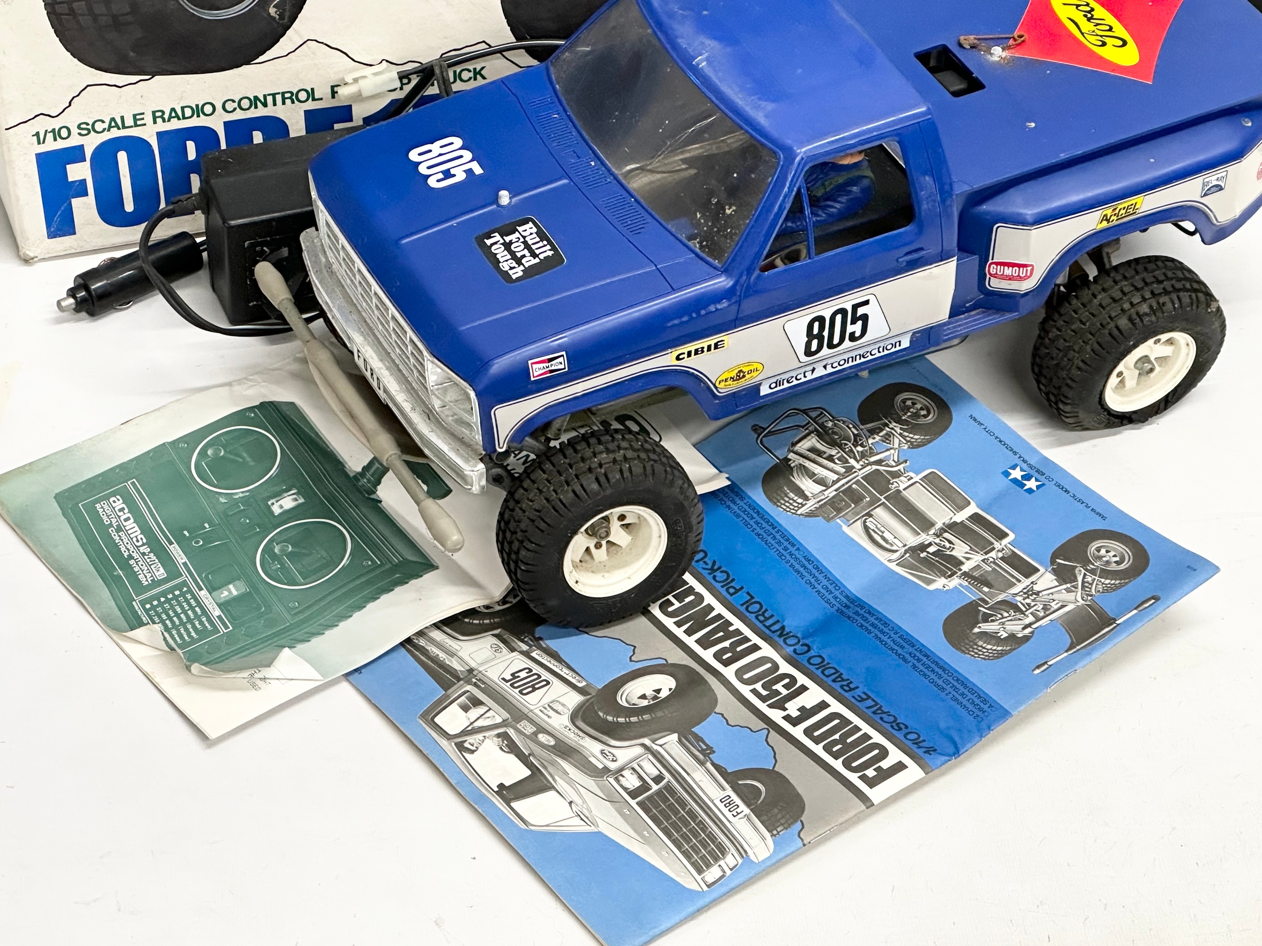 A Tamiya Riko Ford F 150 Ranger XLT radio control pick up truck with box. 1/10 scale. Remote and - Image 3 of 6