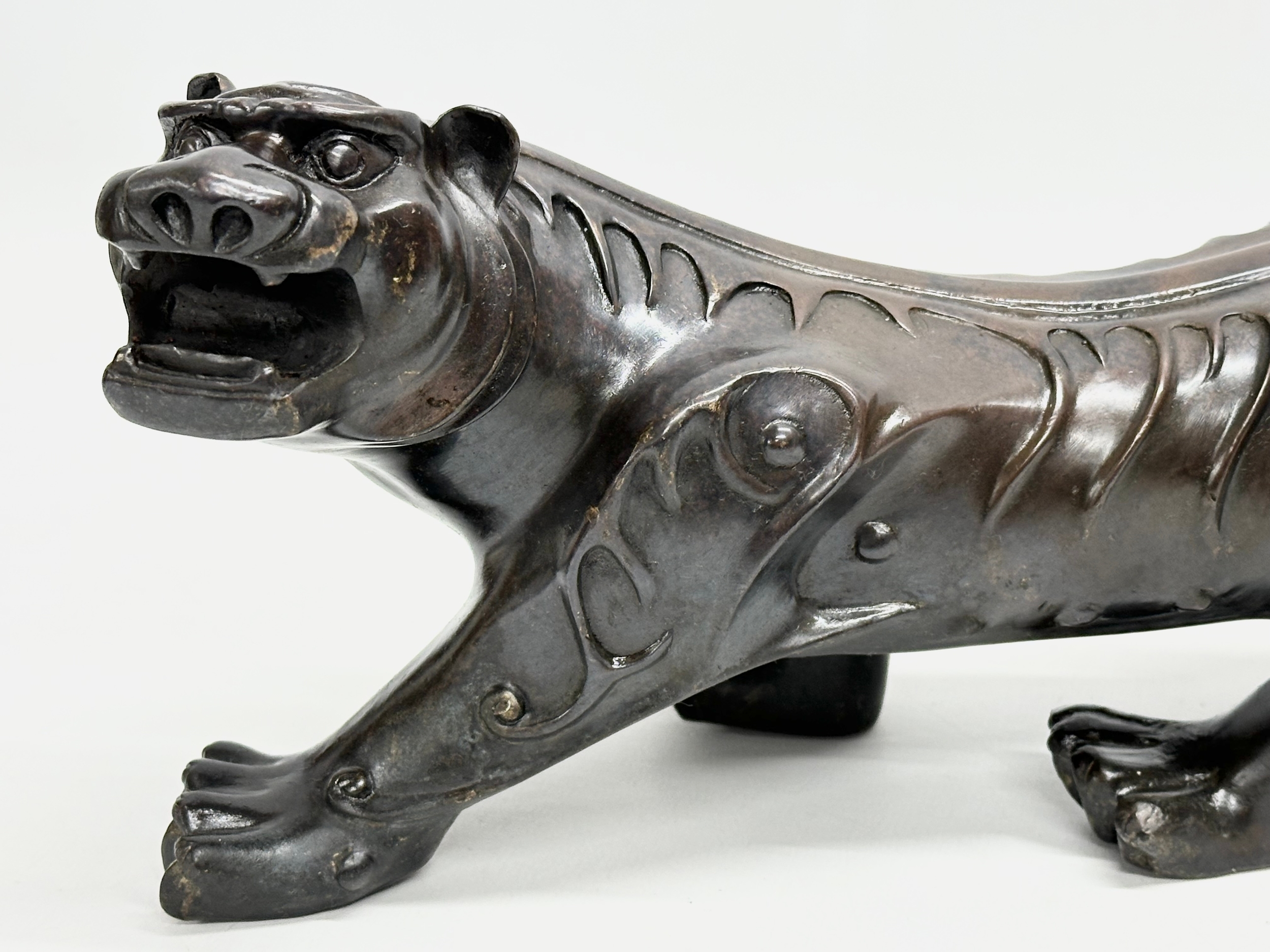 An Early 20th Century Chinese Feng Shui bronze Evil and Wealth Tiger. 38cm - Image 2 of 7
