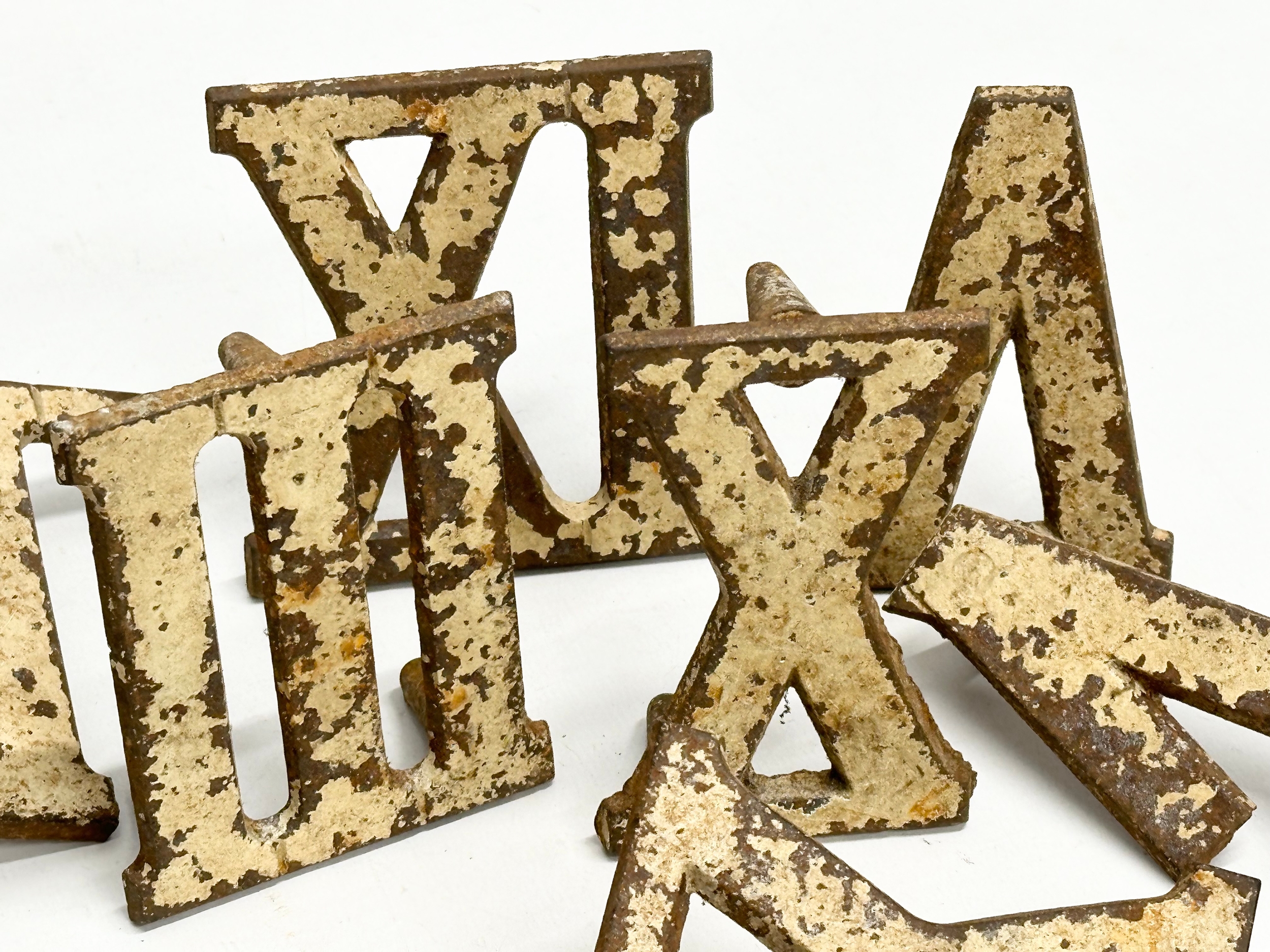 A collection of vintage cast iron Roman Numerals - Image 5 of 6