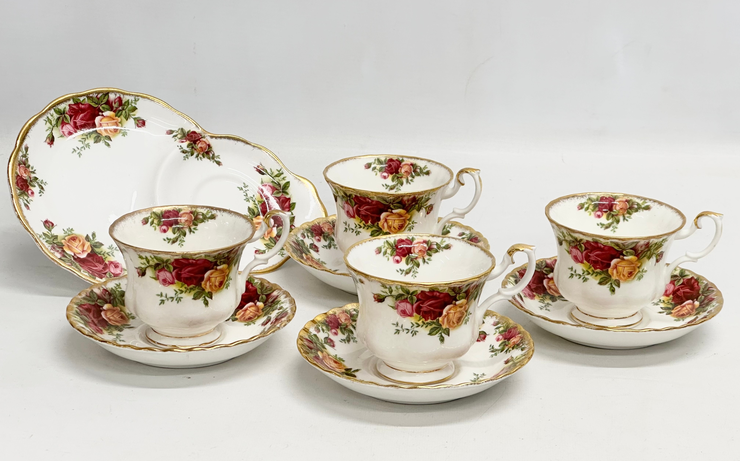 4 Royal Albert ‘Old Country Roses’ tea cups and saucers with sandwich plate